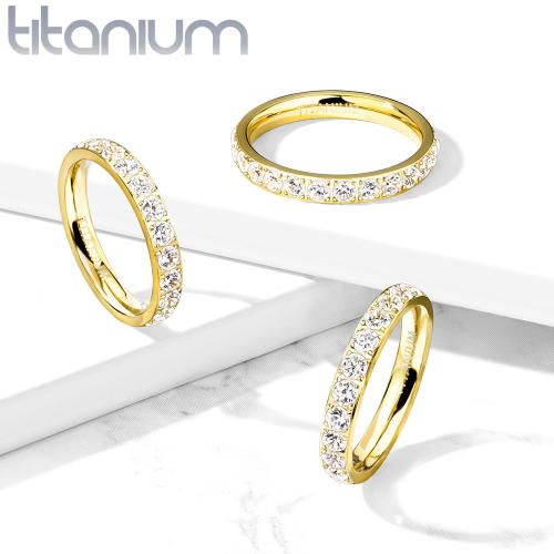 Купить женское кольцо из титана с фианитами Lonti TI-4407 цвет желтого золота оптом от 1 390 руб.